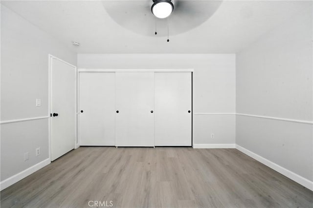 10655 Springfield Dr, Rancho Cucamonga, CA 91730 - unfurnished bedroom featuring wood finished floors, a closet, and ceiling fan