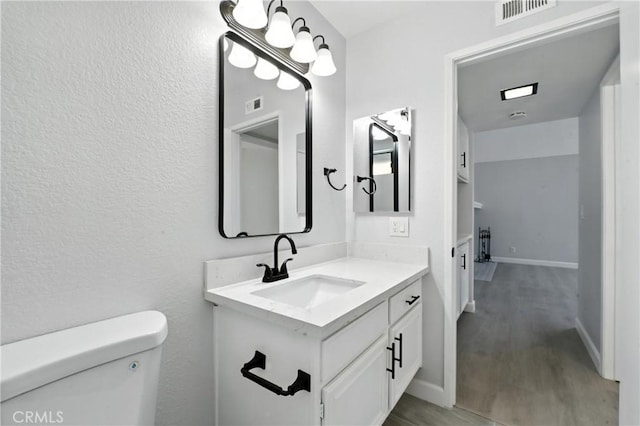 10655 Springfield Dr, Rancho Cucamonga, CA 91730 - bathroom with wood finished floors and vanity