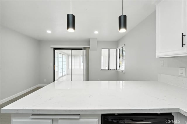 10655 Springfield Dr, Rancho Cucamonga, CA 91730 - kitchen with light stone counters, white cabinetry, recessed lighting, dishwasher, and decorative light fixtures