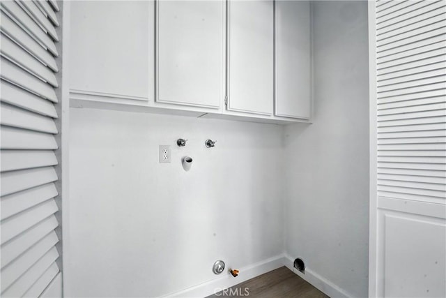 10655 Springfield Dr, Rancho Cucamonga, CA 91730 - laundry area featuring gas dryer hookup, cabinet space, dark wood finished floors, and hookup for a washing machine