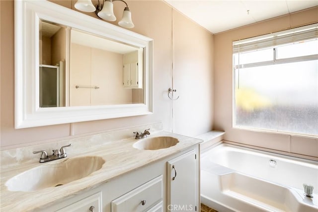 32540 San Miguelito Dr, Thousand Palms, CA 92276 - full bathroom with double vanity, plenty of natural light, and a garden tub