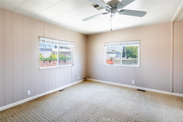 32540 San Miguelito Dr, Thousand Palms, CA 92276 - carpeted empty room with a ceiling fan and baseboards