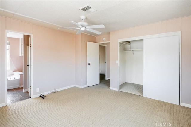 32540 San Miguelito Dr, Thousand Palms, CA 92276 - unfurnished bedroom featuring carpet, a closet, ensuite bathroom, and ceiling fan