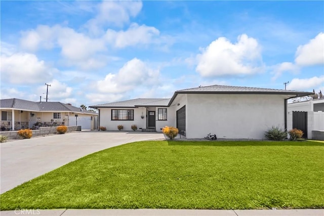 19408 Campaign Dr, Carson, CA 90746 - view of front of home featuring concrete driveway, a garage, and stucco siding