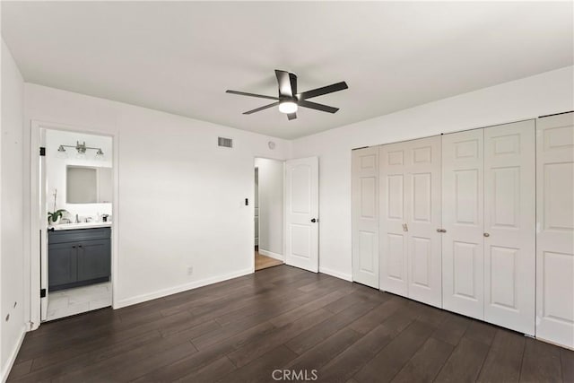19408 Campaign Dr, Carson, CA 90746 - unfurnished bedroom featuring dark wood-style floors, a closet, ensuite bath, and ceiling fan