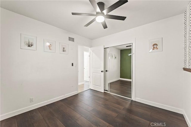 19408 Campaign Dr, Carson, CA 90746 - unfurnished bedroom with dark wood-style flooring, ceiling fan, and a closet
