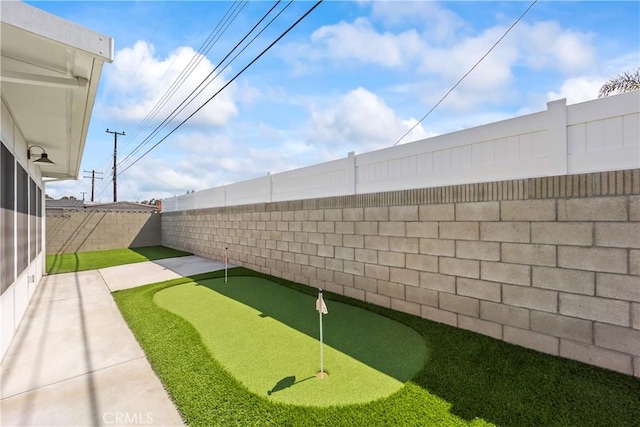 19408 Campaign Dr, Carson, CA 90746 - fenced backyard featuring an area to practice putting