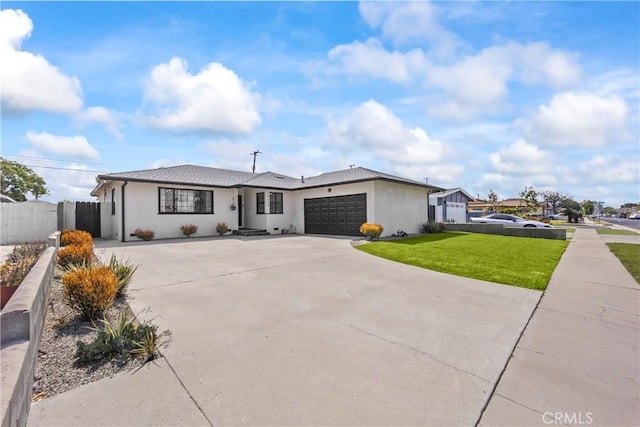 19408 Campaign Dr, Carson, CA 90746 - ranch-style house featuring concrete driveway, a garage, and stucco siding
