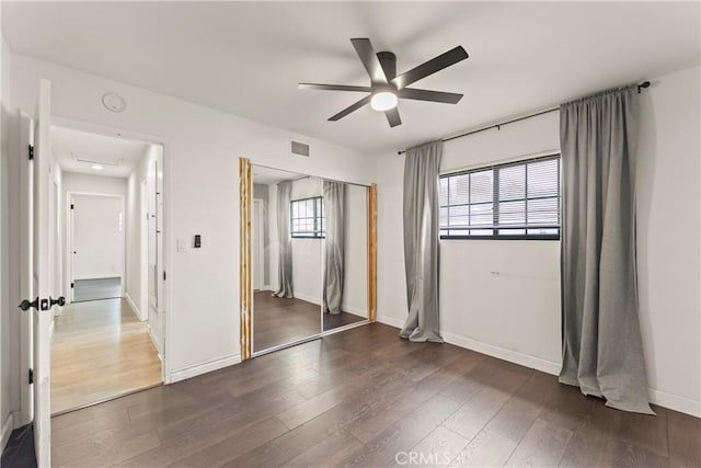 19408 Campaign Dr, Carson, CA 90746 - unfurnished bedroom featuring dark wood-style floors, a closet, and ceiling fan