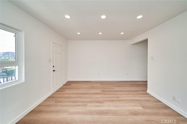 1103 S Hobart Blvd, Los Angeles, CA 90006 - unfurnished room featuring recessed lighting and light wood finished floors
