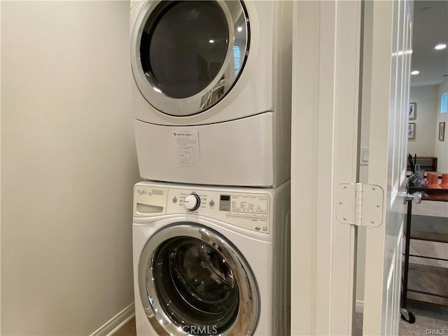 265 N Standard Ave, Santa Ana, CA 92701 - laundry area featuring stacked washer / drying machine and baseboards