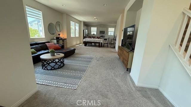 265 N Standard Ave, Santa Ana, CA 92701 - carpeted living room with baseboards