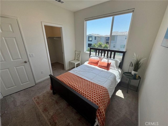 265 N Standard Ave, Santa Ana, CA 92701 - carpeted bedroom with a walk in closet and a closet