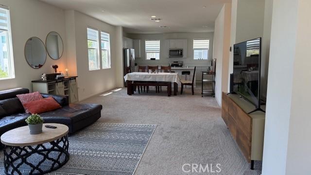 265 N Standard Ave, Santa Ana, CA 92701 - living room with plenty of natural light and light carpet