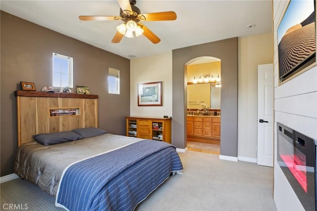 15 Ardmore, Irvine, CA 92602 - bedroom with light colored carpet, ceiling fan, and ensuite bath