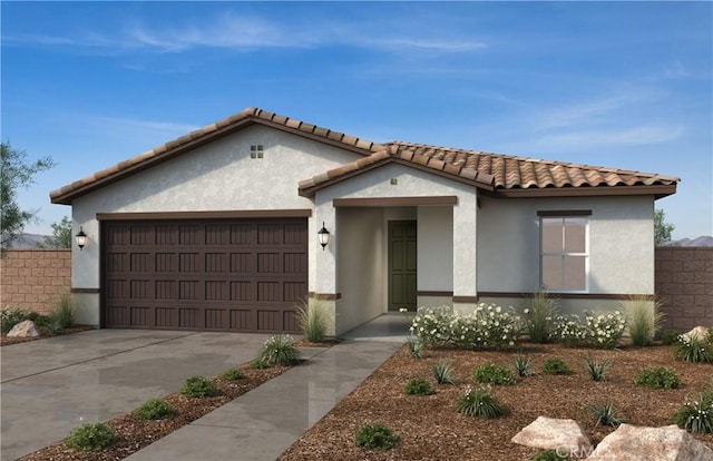 848 Porta Marina Ln, Lake Elsinore, CA 92530 - mediterranean / spanish house featuring an attached garage, concrete driveway, stucco siding, and a tiled roof