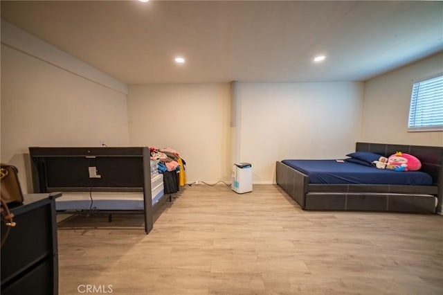 8936 Summerwood Way, Fontana, CA 92335 - bedroom with wood finished floors and recessed lighting