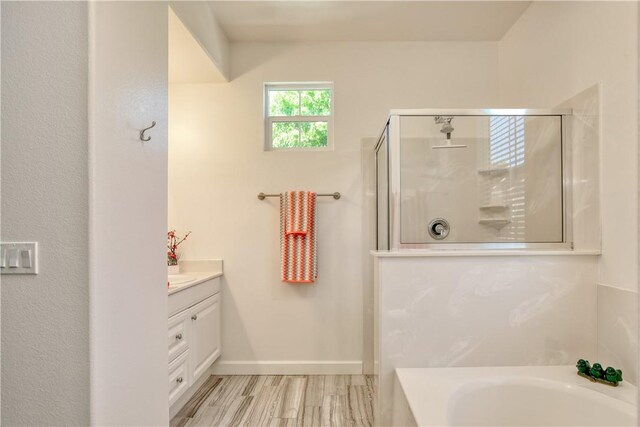 3591 Sacramento Dr Unit 50, San Luis Obispo, CA 93401 - full bathroom featuring a shower with shower door, a garden tub, and vanity
