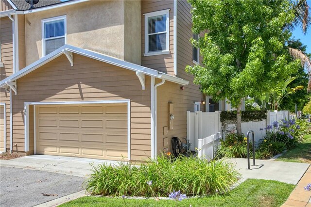 3591 Sacramento Dr Unit 50, San Luis Obispo, CA 93401 - garage featuring driveway
