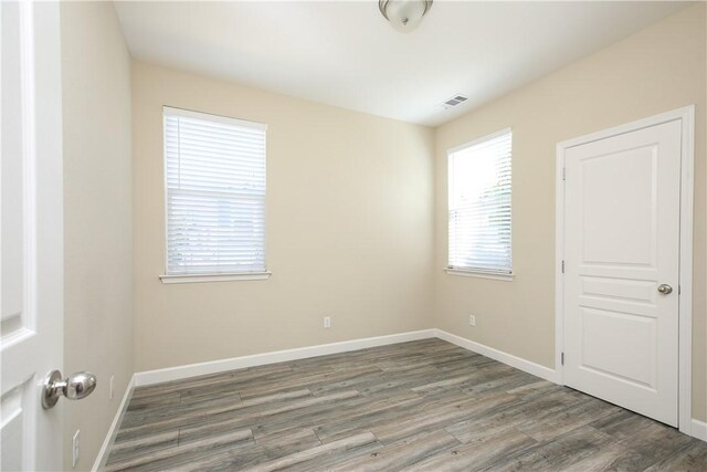3591 Sacramento Dr Unit 50, San Luis Obispo, CA 93401 - unfurnished bedroom with wood finished floors and baseboards