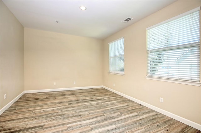 3591 Sacramento Dr Unit 50, San Luis Obispo, CA 93401 - empty room featuring wood finished floors and recessed lighting