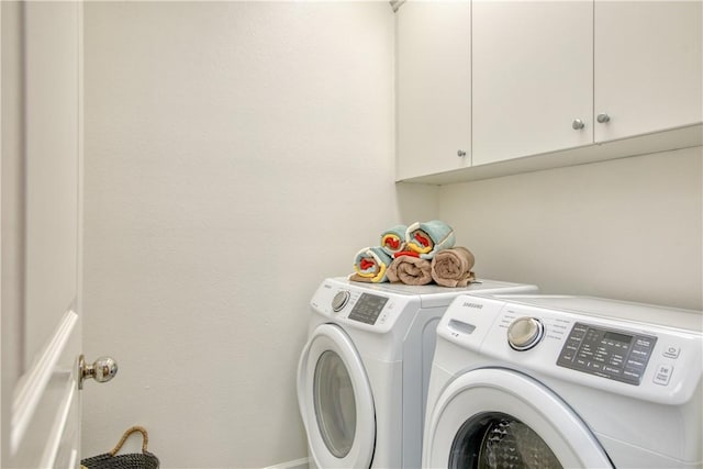 3591 Sacramento Dr Unit 50, San Luis Obispo, CA 93401 - laundry area featuring separate washer and dryer and cabinet space