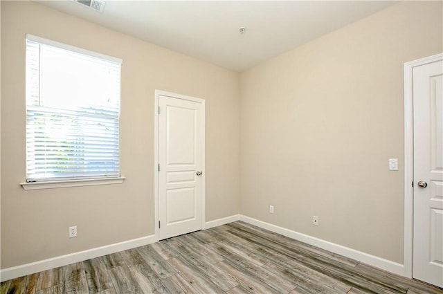 3591 Sacramento Dr Unit 50, San Luis Obispo, CA 93401 - unfurnished room featuring light wood-type flooring and fire sprinkler in ceiling