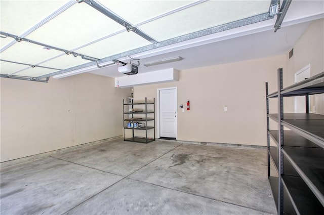 3591 Sacramento Dr Unit 50, San Luis Obispo, CA 93401 - garage featuring a garage door opener