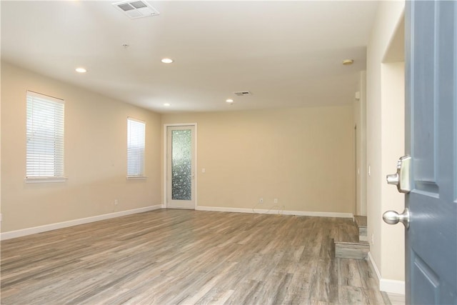 3591 Sacramento Dr Unit 50, San Luis Obispo, CA 93401 - unfurnished room featuring light wood-style floors and recessed lighting