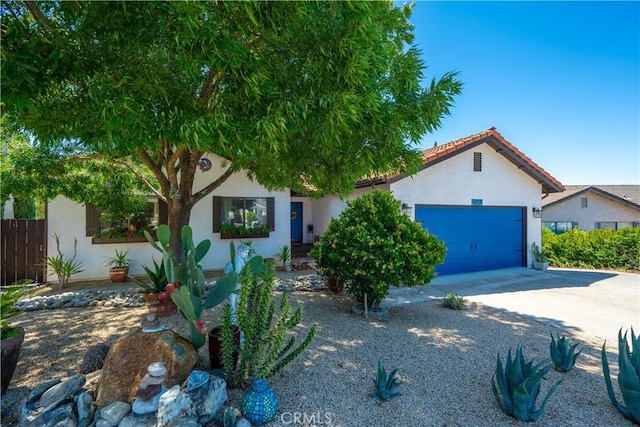 1024 Rachel Ln, Paso Robles, CA 93446 - view of front of house with stucco siding, a garage, and concrete driveway
