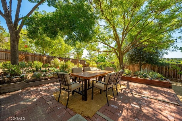 1024 Rachel Ln, Paso Robles, CA 93446 - fenced backyard featuring a patio and outdoor dining space