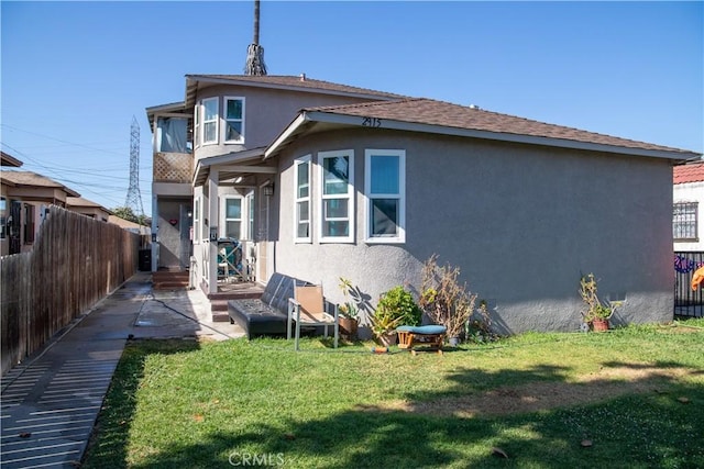 2913 Illinois Ave, South Gate, CA 90280 - rear view of house with stucco siding