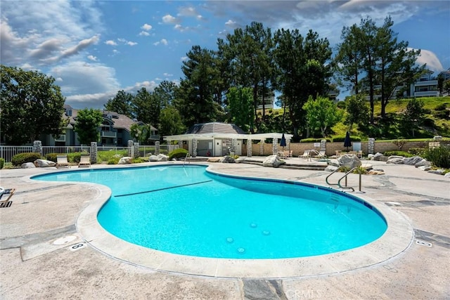 20334 Rue Crevier Unit 621, Canyon Country, CA 91351 - community pool with a patio area