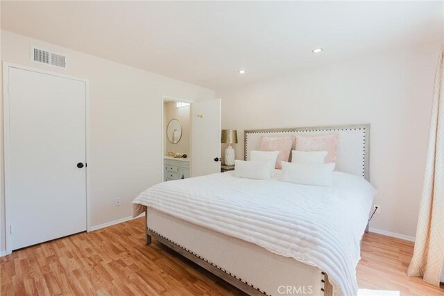 20334 Rue Crevier Unit 621, Canyon Country, CA 91351 - bedroom featuring light wood-style flooring, recessed lighting, and ensuite bathroom