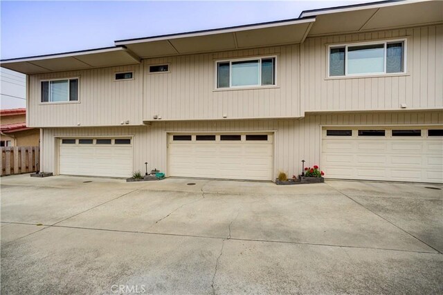641 Piney Way Unit D, Morro Bay, CA 93442 - view of front of home featuring concrete driveway and a garage