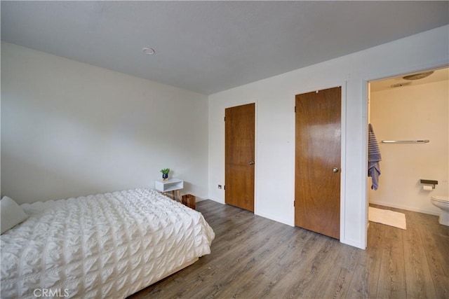641 Piney Way Unit D, Morro Bay, CA 93442 - bedroom with wood finished floors and two closets