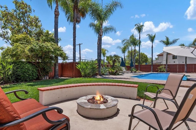 2270 Ritter Pl, Escondido, CA 92029 - fenced backyard featuring an outdoor fire pit and a patio
