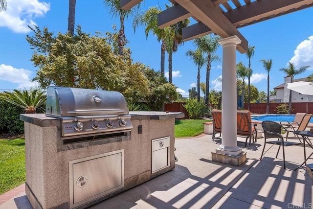 2270 Ritter Pl, Escondido, CA 92029 - fenced backyard featuring exterior kitchen, a patio, and a pergola