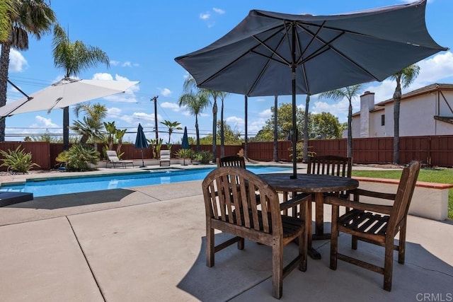 2270 Ritter Pl, Escondido, CA 92029 - view of swimming pool with a patio, a fenced backyard, and outdoor dining space