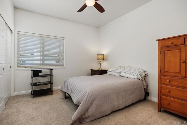 2270 Ritter Pl, Escondido, CA 92029 - bedroom with light colored carpet, a closet, and a ceiling fan