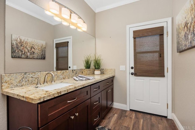 2270 Ritter Pl, Escondido, CA 92029 - bathroom with wood finished floors, vanity, and crown molding