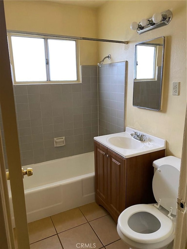 438 W Ramona Dr, Rialto, CA 92376 - bathroom featuring tile patterned flooring, shower / tub combination, and vanity