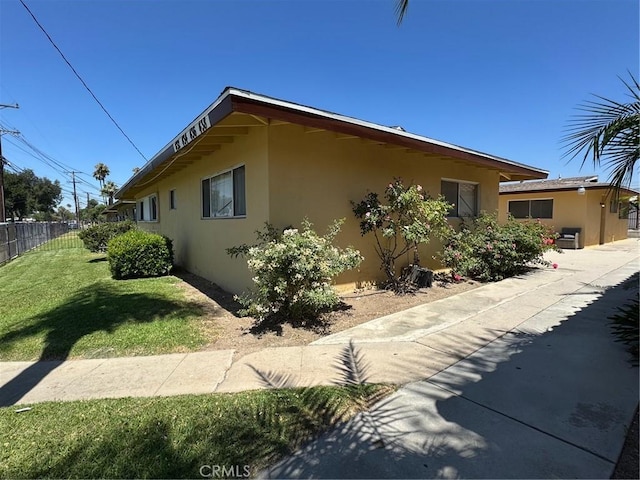 438 W Ramona Dr, Rialto, CA 92376 - view of property exterior featuring stucco siding