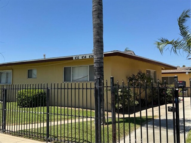 438 W Ramona Dr, Rialto, CA 92376 - gate with a fenced front yard