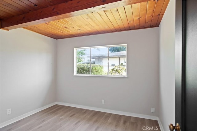 1625 Rose Ave, Merced, CA 95341 - unfurnished room with a wood ceiling with exposed beams and light wood finished floors