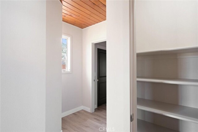 1625 Rose Ave, Merced, CA 95341 - corridor with wooden ceiling and light wood-style flooring