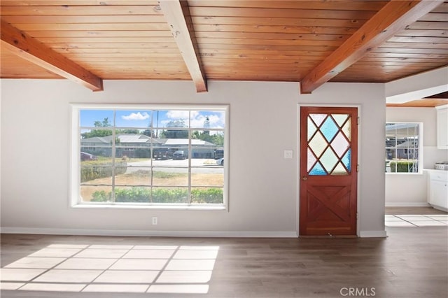 1625 Rose Ave, Merced, CA 95341 - entryway with light wood finished floors and a wooden ceiling with exposed beams