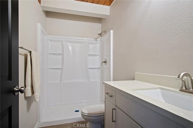 1625 Rose Ave, Merced, CA 95341 - full bath featuring vanity, a shower, and a textured wall