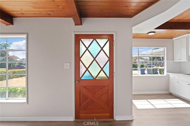 1625 Rose Ave, Merced, CA 95341 - foyer with a wood ceiling with exposed beams and light wood finished floors