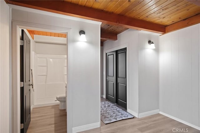 1625 Rose Ave, Merced, CA 95341 - corridor featuring light wood-type flooring and a wood ceiling with exposed beams